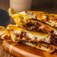 The Undergrad Quesadilla · When you’re almost there, a quesadilla filled with choice of meat served with pico de gallo,...
