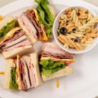 Club · Oven smoked turkey, ham, roast beef, thick sliced smoked bacon, Colby jack cheese, green lea...