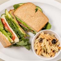 Veggie Lover · Avocado, smooth provolone cheese, crisp. Green leaf lettuce, fresh tomatoes, thin sliced red...
