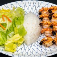 Skewered Shrimp · Two skewers of seasoned, plump shrimps, char-broiled and served with teriyaki sauce.