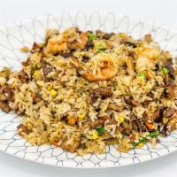 House Fried Rice · Stir-fried rice with chicken, beef, pork and shrimp.