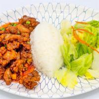 Sweet & Sour Chicken · Deep-fried chicken sautéed in sweet and sour sauce with onions and carrots.