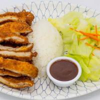 Chicken Breast Katsu · Juicy strips of chicken breast, battered and breaded and deep-fried, served with a side of t...