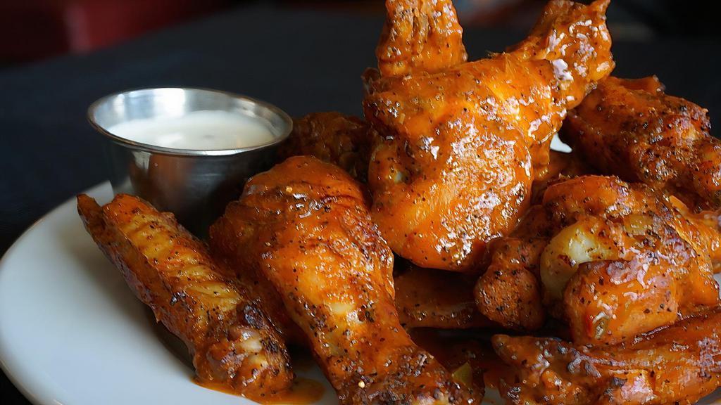 Baked New York Chicken Wings · 12 each. Medium, hot, honey hot, bbq, honey bbq. Served with ranch or blue cheese dressing.