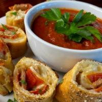 Pizza Rollup · Tasty bread stuffed with your choice of two toppings. Brushed with garlic butter, parmesan c...