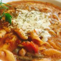 Bowl Baked Minestrone · Topped with garlic cheese bread and melted mozzarella.