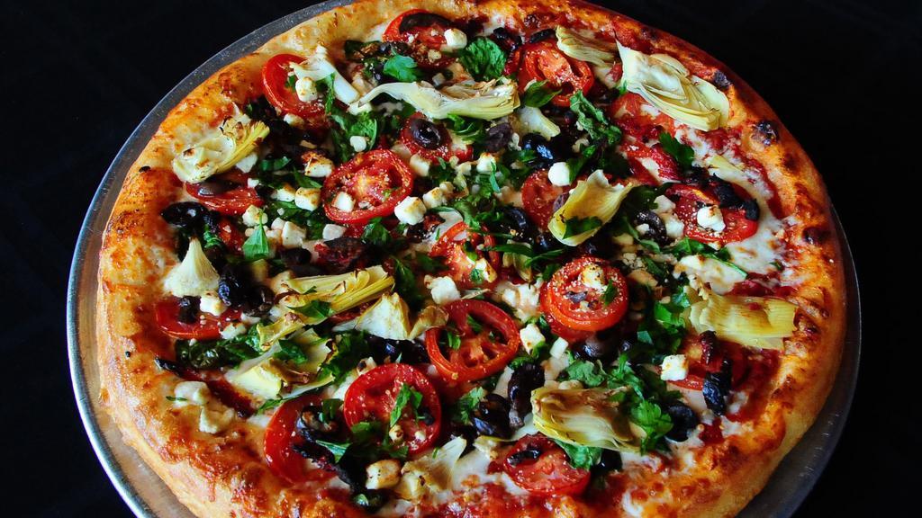 Mediterranean Pizza · Spinach, Roma tomatoes, red onions, sun dried tomatoes, artichokes, kalamata olives, feta.
