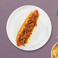 Chunky Chili Vegan Dog · Vegan hot dog topped with vegan chili served on a toasted hot dog bun.