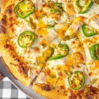 Sonoran · White sauce based. Roast chicken, green chiles, jalapenos, and jack cheese.