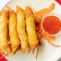 Sleeping Prawns · Eight pieces. Deep-fried tiger prawns wrapped in wonton skin and served with sweet chili sau...