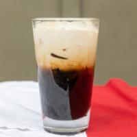Thai Ice Coffee · House special Thai Coffee with creamy 1/2 & 1/2 or coconut milk.
