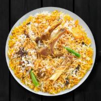 Goat Biryani · Long grained rice flavored with fragrant spices flavored along with saffron and layered with...