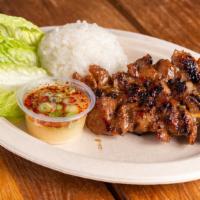 Moo Ping · grilled Thai marinated sweet pork on skewers, “jaew sauce”, steamed sticky rice