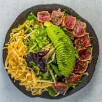 Seared Ahi Salad · Pan-seared shichimi spiced Ahi, baby greens, avocado, jicama, carrots, and crispy wontons | ...