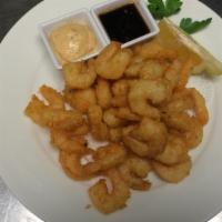 Shrimp Poppers · Tender shrimp fried in a lightly spiced batter. Served with our spicy aioli and habanero ter...