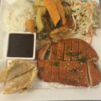 Chicken Katsu · Tender panko breaded chicken breast.  Served with Japanese BBQ sauce, tempura vegetables, an...