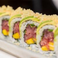 D.* · Tuna, mango, and cilantro. Topped with avocado and tempura crunchies. Drizzled with spicy sw...