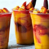 Ice Blended Mangoneada · Fresh Mango Ice Blended with Tajin and Chamoy!