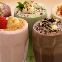 Milk Shakes · Made with your favorite  natural fruit, vanilla, or chocolate.