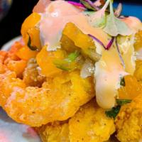 Crispy Shrimp Tacos · Mixed cabbage slaw, chipotle mayo, pico de gallo.