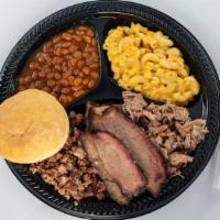 Combo Plate · You'll get our mesquite smoked sliced brisket, chopped brisket and chopped pork butt. Includ...