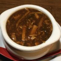 Hot & Sour Soup - Súp Chua Cay · Wispy beaten eggs, mushroom, julienned tofu, bamboo shoots, wood ears, and shredded pork in ...