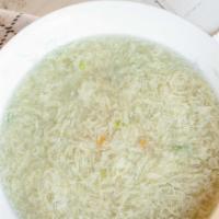 Egg Drop Soup - Súp Trứng · Wispy beaten eggs, creamed corn, diced carrot, and green peas in cornstarch thickening chick...