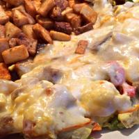 Lucie'S Scramble · Three Eggs scrambled with Sausage, Mushrooms, Bell Peppers, Grilled Onions and Muenster Cheese