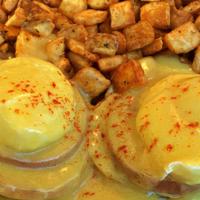 Eggs Benedict · A Grilled English Muffin, Canadian Bacon and two Poached Eggs, smothered in our Hollandaise ...