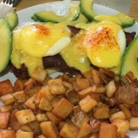 Club Benny · A Grilled English Muffin, Sliced Turkey, Bacon and Avocado, two Poached Eggs, smothered in H...