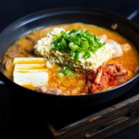 Boodae Jjigae (부대찌개) · Spicy soup with kimchi, ham, bacon, baked bean and ramen