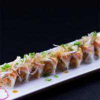 Salmon Lover'S  · In: Spicy Salmon, Avocado, Cucumber
Top: Seared Salmon, Sliced Onions
Sauce: Spicy Mayo