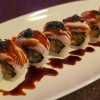 White Snake  · In: Spicy Tuna, Cucumber, Avocado
Top: Seared Escolar, Tobiko, Jalapeno
Sauce: Eel Sauce, Ba...