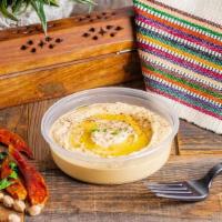 Classic Hummus · Our traditional hummus is made from all-natural, never canned, dried chickpeas.  We pride ou...