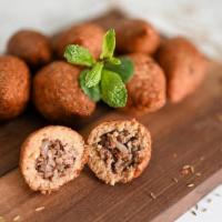 Beef Kibbe (3 Piece) · A mixture of bulgur wheat, onions, pine nuts, and ground beef forms a hollow shell for a del...