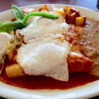 Breakfast Enchiladas · 3 cheese enchiladas and 2 eggs, served with beans and home fries, choice of red or green chi...