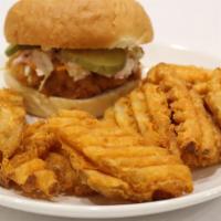 Crispy Chicken Sandwich · Chicken breast served with coleslaw, pickles, choice of sauce, on a brioche bun or Texas toa...