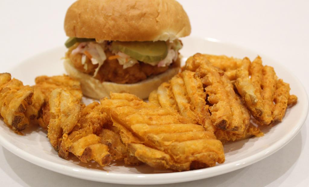 Crispy Chicken Sandwich · Chicken breast served with coleslaw, pickles, choice of sauce, on a brioche bun or Texas toast. Comes with a side of seasoned criss cut fries.