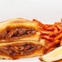 Bbq Brisket Grilled Cheese · Texas toast grilled cheese with cheddar cheese, smoked brisket and BBQ sauce