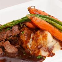 Beef Tenderloin Tips · Tender beef medallions seared to perfection, simmered in red wine demi-glace and served with...