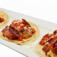 Hangover Street Tacos · Scrambled Eggs, melted cheddar-jack cheese, applewood bacon, pico de gallo and corn tortilla...