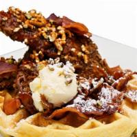 B&B Waffle W/ Pretzel Chicken · Pretzel crusted fried chicken and a Belgian waffle topped with Siracha candied bacon, toaste...