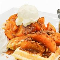 Peach Cobbler Waffle · Belgian waffle with roasted peach cobbler filling topped with cobbler crumble and whipped cr...