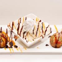 Confetti Deep Fried Oreos · 6 Confetti battered Oreo Cookies served with vanilla ice cream and drizzled with chocolate a...