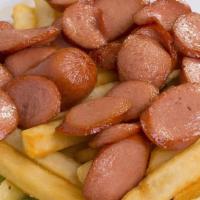 Salchipapas · French fries topped with fried hot dogs.