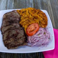 Tacu Tacu Con Bistec · Rice, beans and non-spicy yellow pepper stir fry. Served with Six ounces steak.