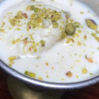 Ras Malai (2 Pcs) · Ras Malai,also known as rossomalai, dumplings made from cottage cheese soaked in sweetened, ...