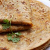 Ajwain Paratha · Whole wheat bread lightly salted with roasted carom seeds.