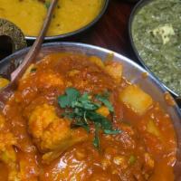 Aloo Gobi · A vegetarian dish from the Indian subcontinent made with potatoes (aloo), cauliflower (gobi)...