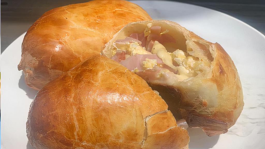The Canadian Kolache · *Newly Improved* Must try! Canadian Bacon, egg and white cheese made fresh in our Home Made Bread Pocket.